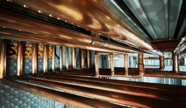 Copper pipes in a ceiling