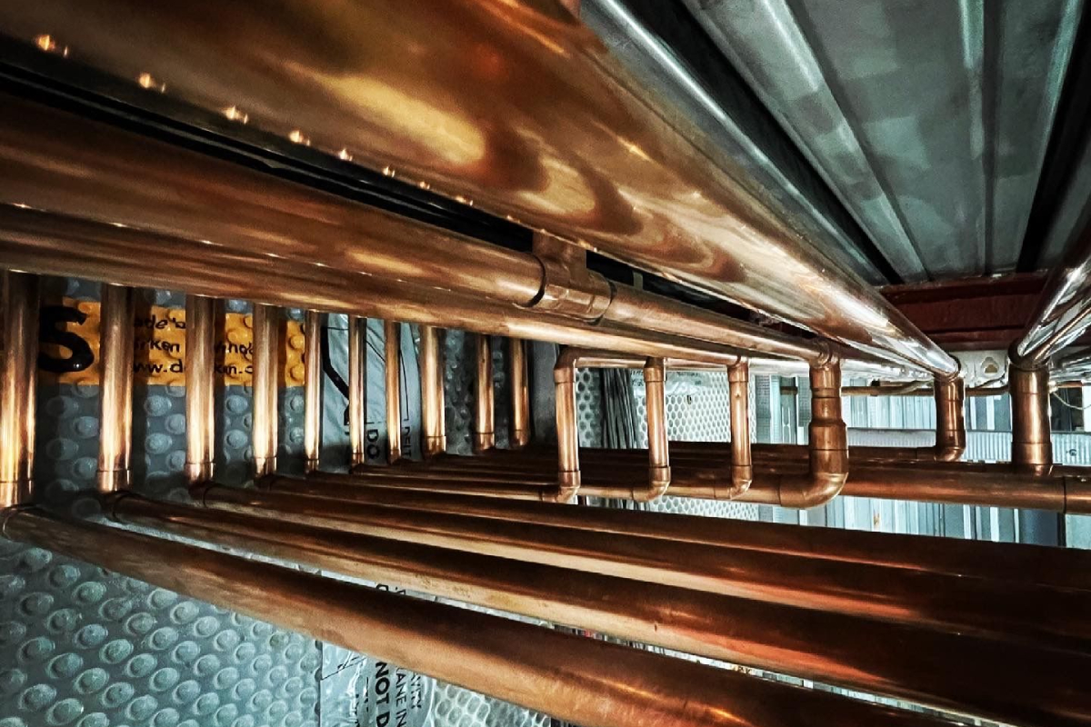 Copper pipes in a ceiling