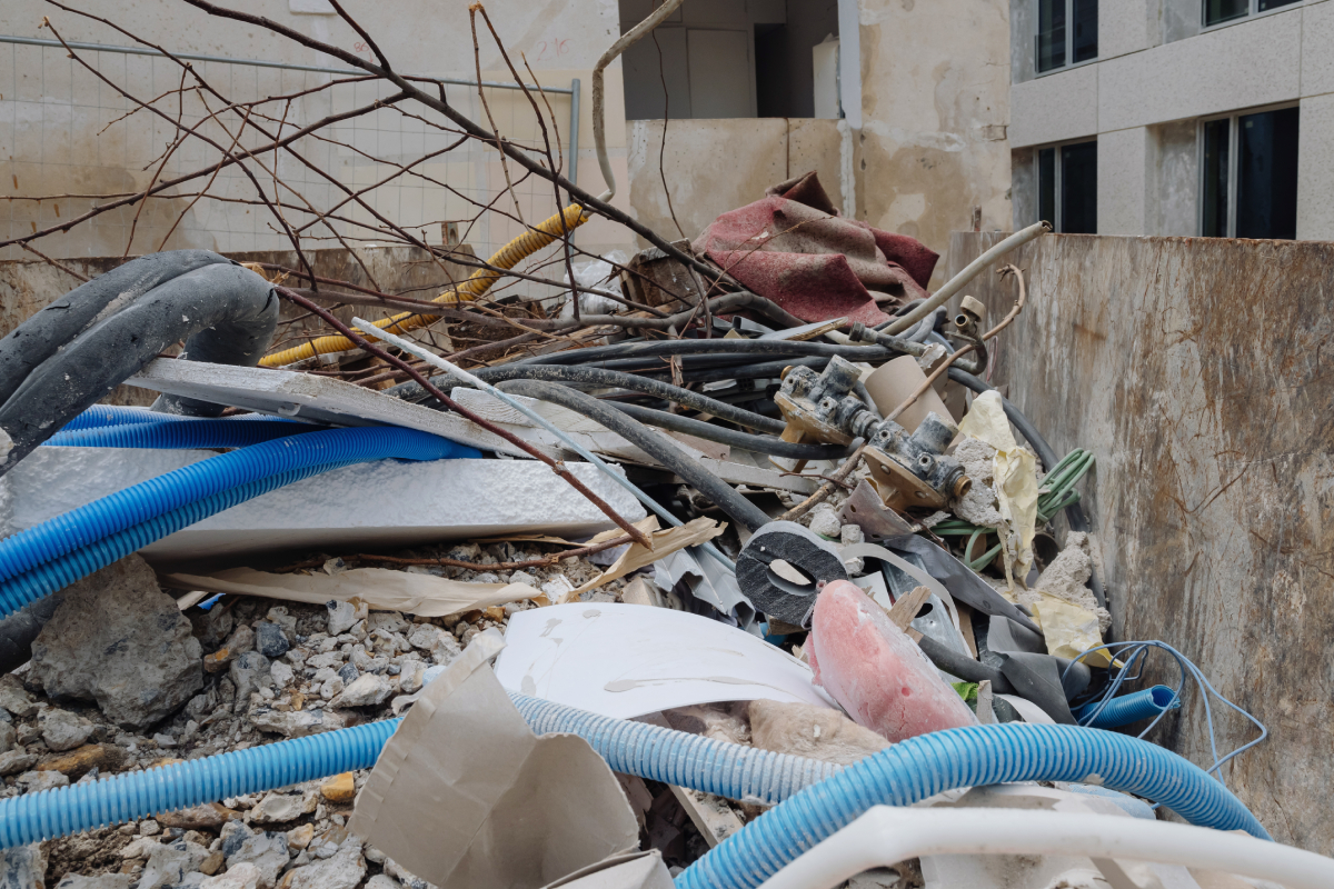 Plastic pipes in a skip