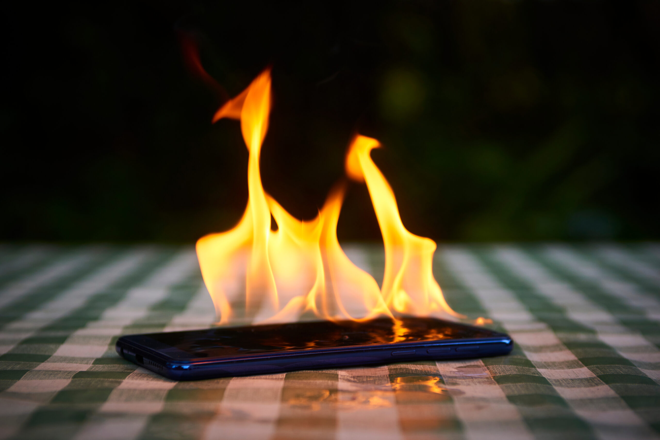 A mobile phone on fire.